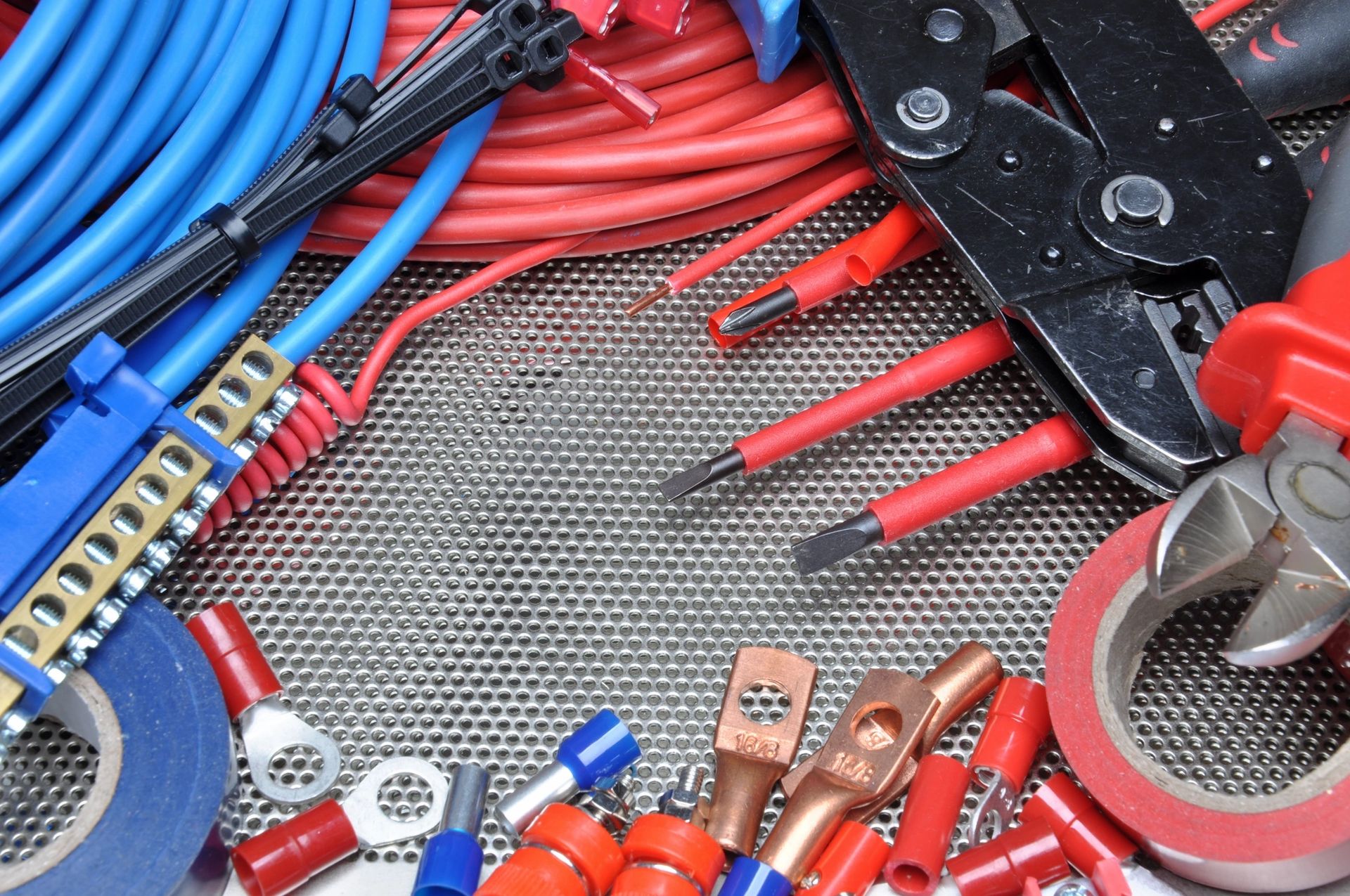 Electrical cables, connectors and tools laid out for a job